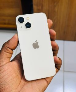 White iPhone 13 mini in hand - Legacy Luxury Store Ghana