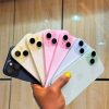 iPhone 15 Plus in black, blue, pink and green held in hand - Legacy Luxury Store Ghana