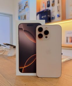 Desert titanium iPhone 16 Pro Max standing next to its box - Legacy Luxury Store Ghana