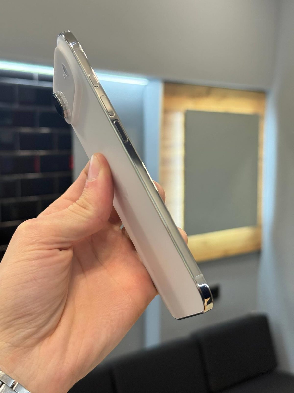 White iPhone 17 Air standing next to box - Legacy Luxury Store Ghana